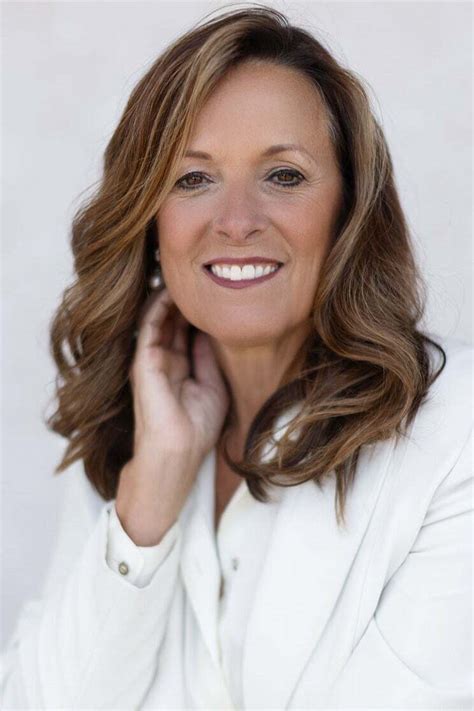 Dr. CHRISTINE DELMONTE .